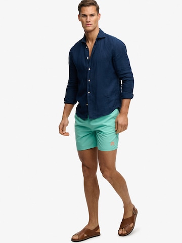 Superdry & Co Rövid fürdőnadrágok 'ESSENTIAL' - zöld