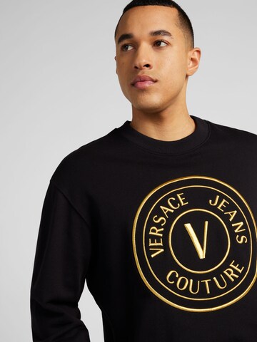 Versace Jeans CoutureSweater majica '76UP306' - crna boja