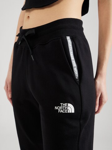 THE NORTH FACE Tapered Housut 'ZUMU' värissä musta