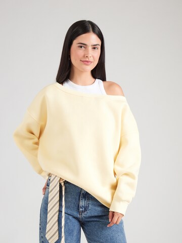 Sweat-shirt 'Asta' ABOUT YOU en jaune : devant
