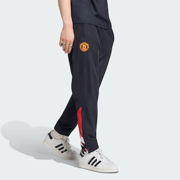 ADIDAS PERFORMANCE - Slimfit Pantalón deportivo 'Manchester United Stadium' en negro: frente