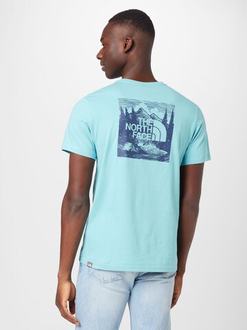THE NORTH FACE T-Shirt 'REDBOX CELEBRATION' in Blau