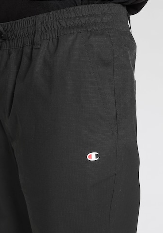 Champion Authentic Athletic Apparel - regular Pantalón deportivo en negro