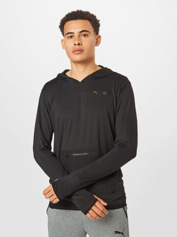 PUMA - Camiseta deportiva 'First Mile' en negro: frente