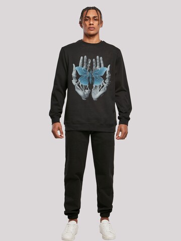 F4NT4STIC Sweatshirt 'Skelett Hände Schmetterling' in Black