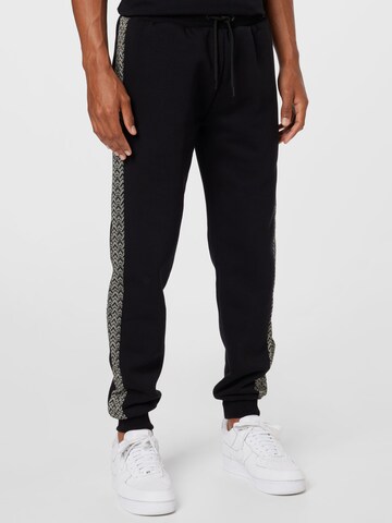 River Island - Tapered Pantalón en negro: frente