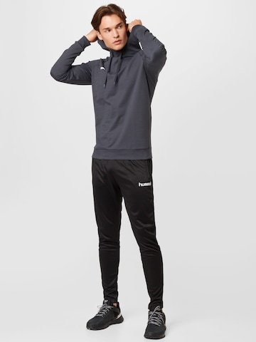 Hummel - Sweatshirt de desporto em cinzento
