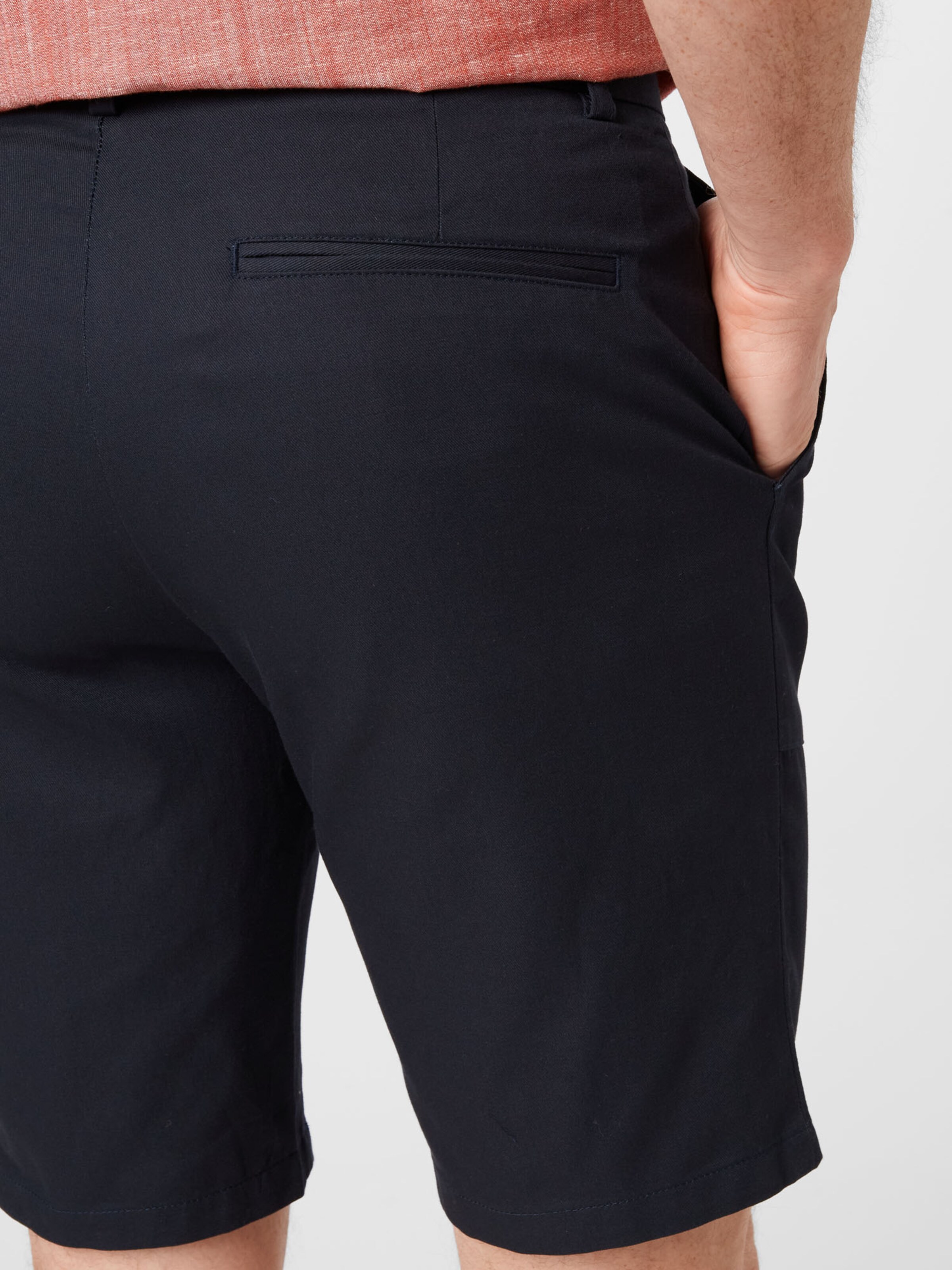 BURTON MENSWEAR LONDON Regular Chino trousers in Navy ABOUT YOU