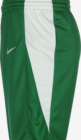 NIKE Loose fit Workout Pants in Green
