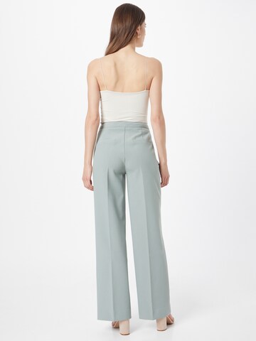 Wide leg Pantaloni cu dungă 'Moore' de la Another Label pe verde