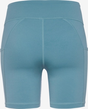 PUMA Skinny Sportbroek in Blauw