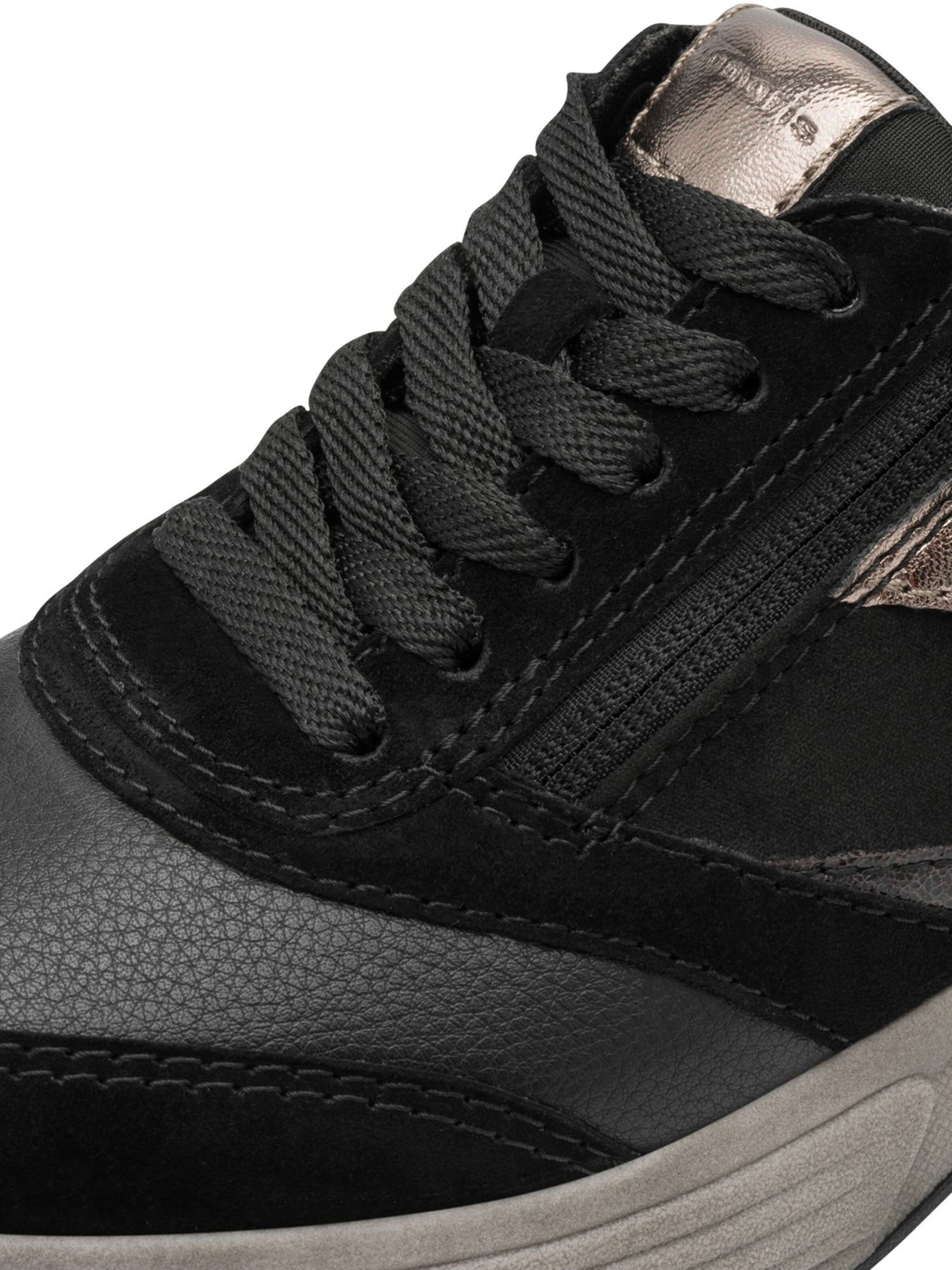 Sneaker bassa di Tamaris in nero