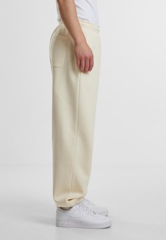 Tapered Pantaloni di Urban Classics in beige