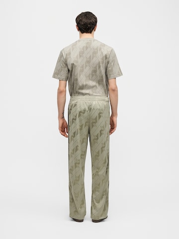 ADIDAS ORIGINALS - Pierna ancha Pantalón 'Firebird' en verde