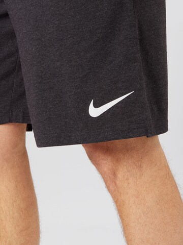 NIKE Normální Sportovní kalhoty – šedá
