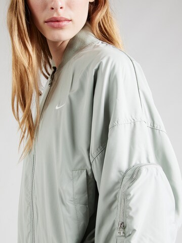 Nike Sportswear Between-season jacket 'ESSNTL' in Green