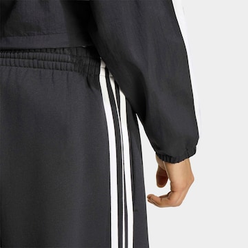 Loosefit Pantaloni sportivi di ADIDAS SPORTSWEAR in nero