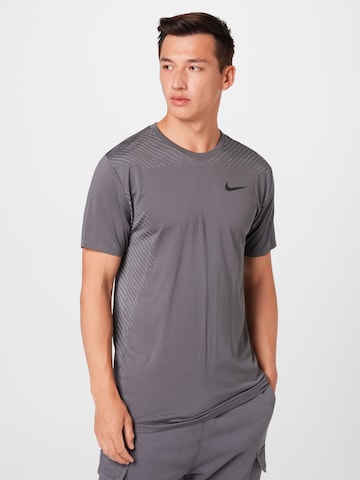 NIKE Функциональная футболка в Серый: спереди