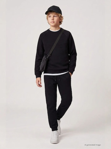 Tommy Life Strój treningowy 'TOMMY Kinder Active Set' w kolorze czarny: przód