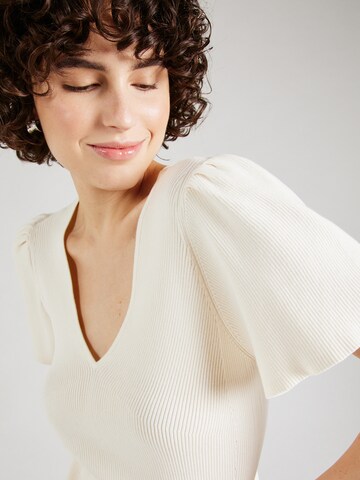 Robes en maille DKNY en blanc