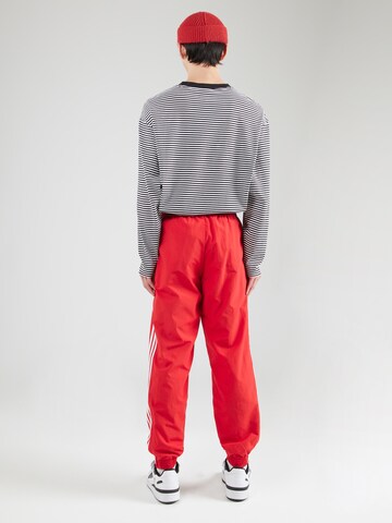 ADIDAS ORIGINALS Tapered Byxa 'FBIRD' i röd