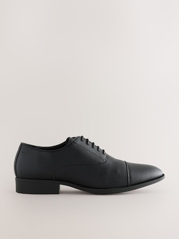 Chaussure à lacets Next en noir