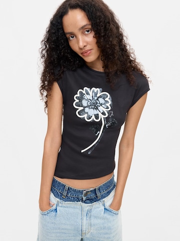 Tricou de la Desigual pe negru: față