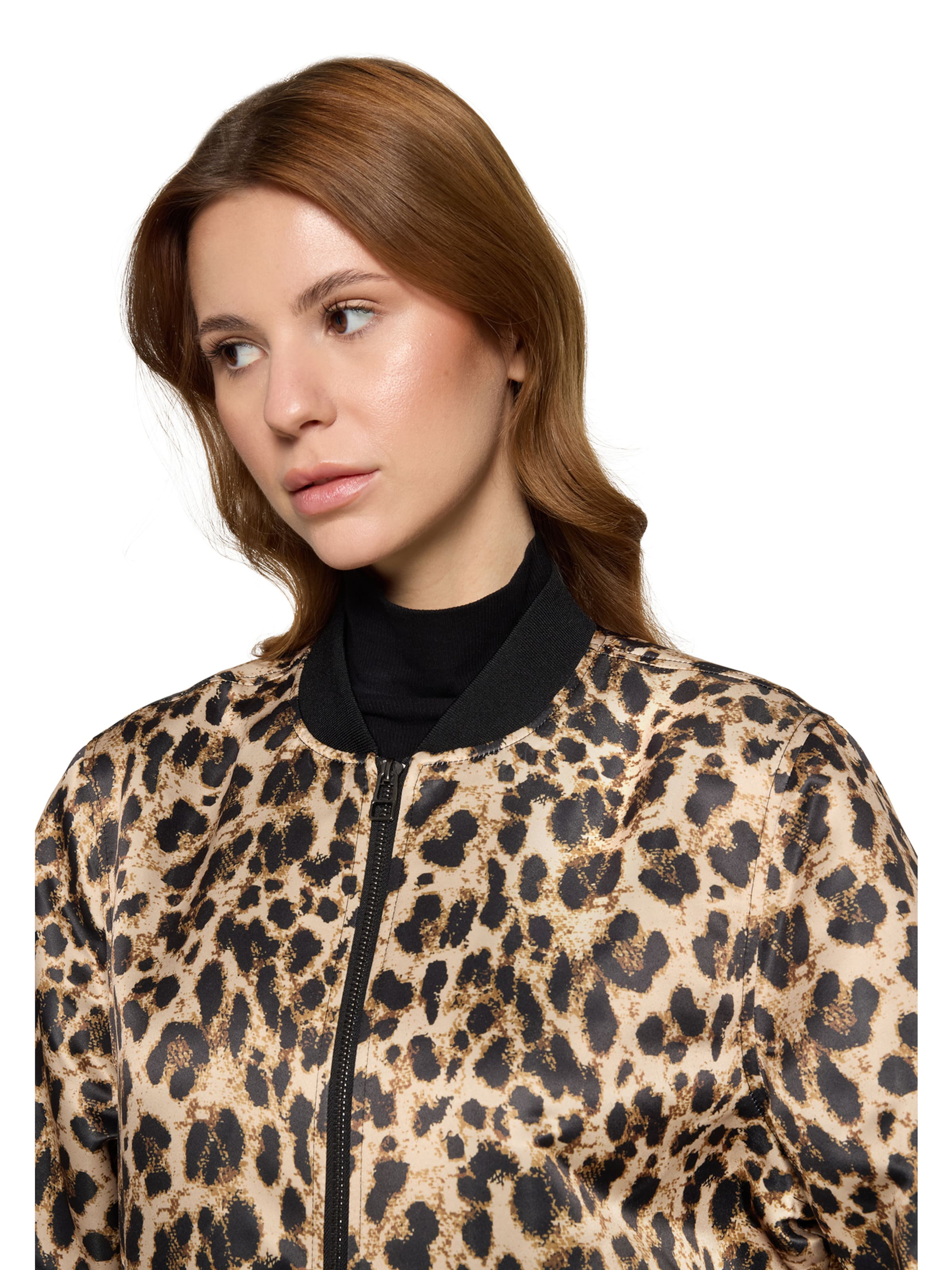 Amber & June Tussenjas in Beige