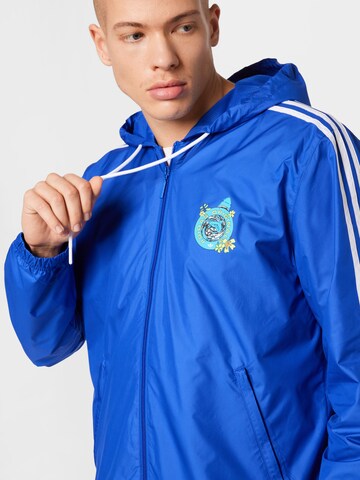 ADIDAS ORIGINALS Funktionsjacke 'Graphic Stoked Fish ' in Blau