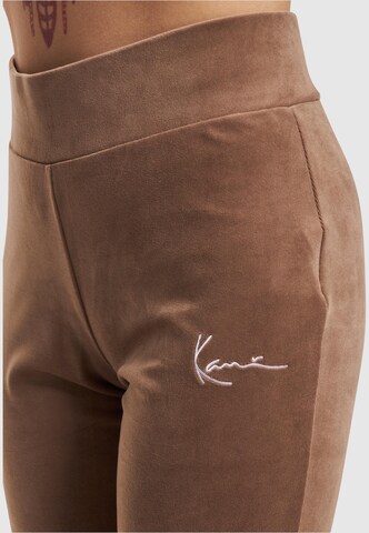 Karl Kani Flared Pants in Brown