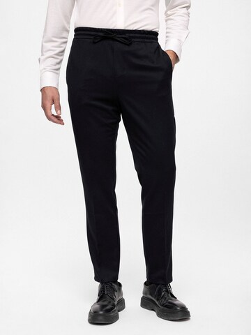 Antioch Slim fit Trousers in Black: front