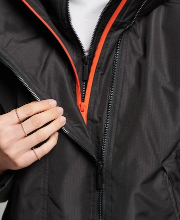 Superdry Toiminnallinen takki 'SD-Windcheater' värissä musta