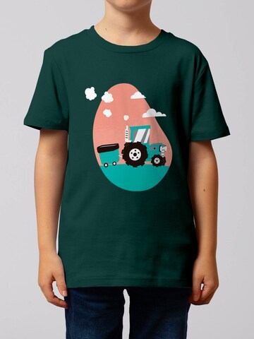 Maglietta 'Traktor' di watabout.kids in verde: frontale