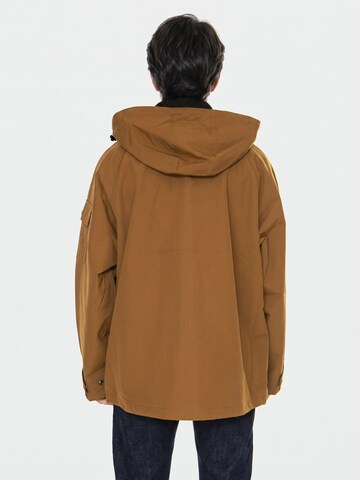 Carhartt WIP Between-season jacket 'Clarton' in Brown