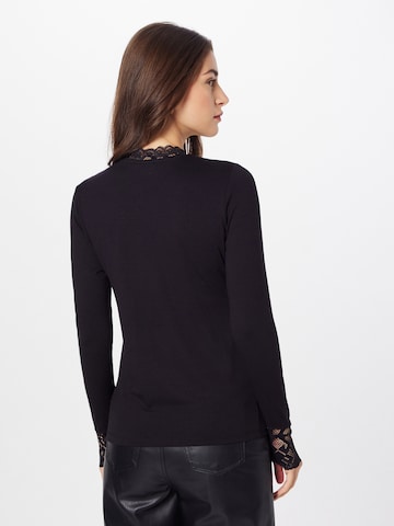 Cream - Blusa en negro