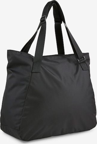PUMA Sportovní taška 'ESS' – černá