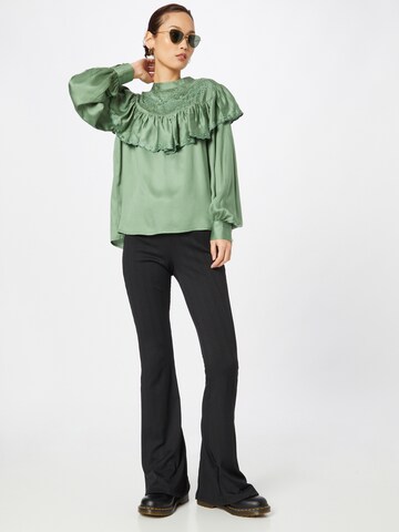 River Island - Blusa em verde