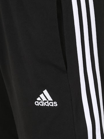 ADIDAS SPORTSWEAR regular Παντελόνι φόρμας 'Essentials' σε μαύρο