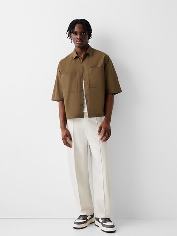 Bershka Loose fit Trousers in Beige