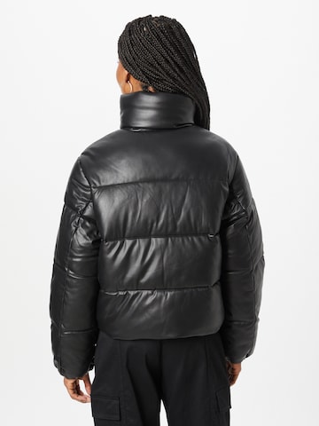 Calvin Klein Φθινοπωρινό και ανοιξιάτικο μπουφάν σε μαύρο