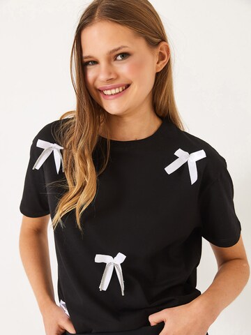 Maglietta di Bianco Lucci in nero: frontale