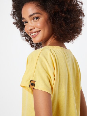 T-shirt 'Schnitzel' Fli Papigu en jaune