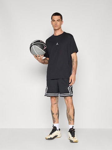 Tricou funcțional de la Jordan pe negru