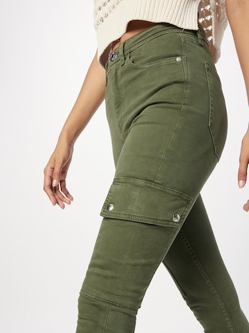 Skinny Jeans cargo 'CHARLOTTE' River Island en vert