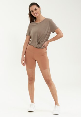 Athlecia Skinny Sporthose 'Almy' in Orange