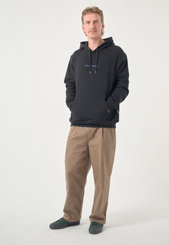 Cleptomanicx Sweatshirt 'Classic Hooded Embrace' in Schwarz