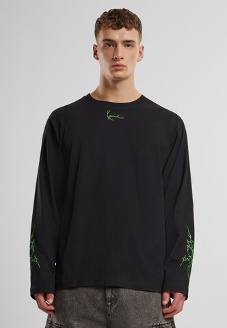 T-Shirt Karl Kani en noir : devant
