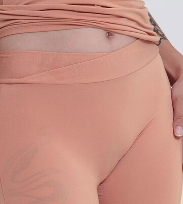 SLOGGI - Pantalón moldeador 'Go Allround Cyclist' en naranja