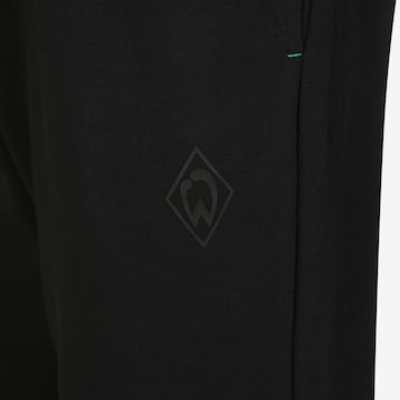 Effilé Pantalon de sport UMBRO en noir