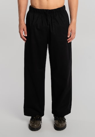 Another Cotton Lab - Loosefit Pantalón en negro: frente